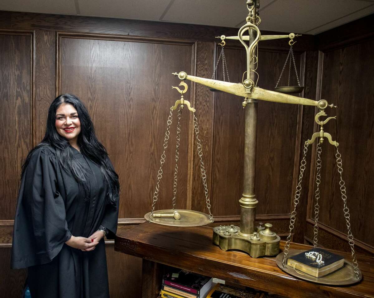 District judge lives life to the fullest after near death experience