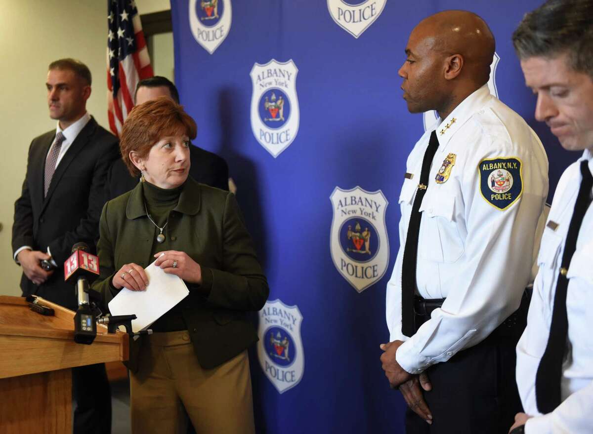 Mayor Kathy Sheehan, left, looks to Albany Police Chief Eric Hawkins, right, after speaking during a press conference to address an alleged assault by Albany police officers on Tuesday, April 2, 2019, at the police headquarters in Albany, N.Y. The incident took place on March 16 after police responded to a call for loud music. (Will Waldron/Times Union)
