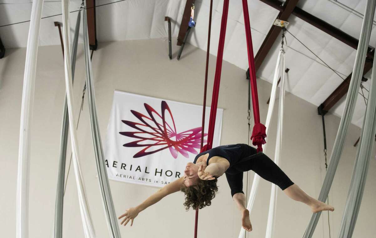 Lauren Breunig rehearses at Aerial Horizon, which is developing an international reputation for its work. It is presenting its first show in its new space, “Divulge.”