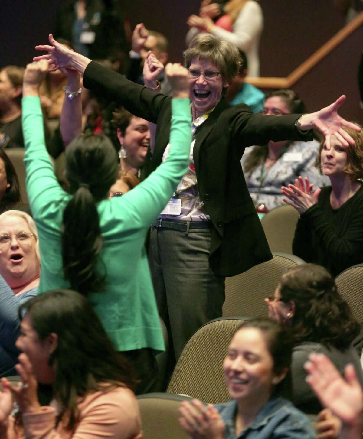 Elizabeth Tanner, right, Palo Alto College vice president for academic success, celebrates Tuesday, April 2, 2019 on the PAC campus as winners are announced for the Aspen Prize for Community College Excellence, the top national award for community colleges. Palo Alto received a Rising Star award from the Institute, which comes with a $100,000 prize.
