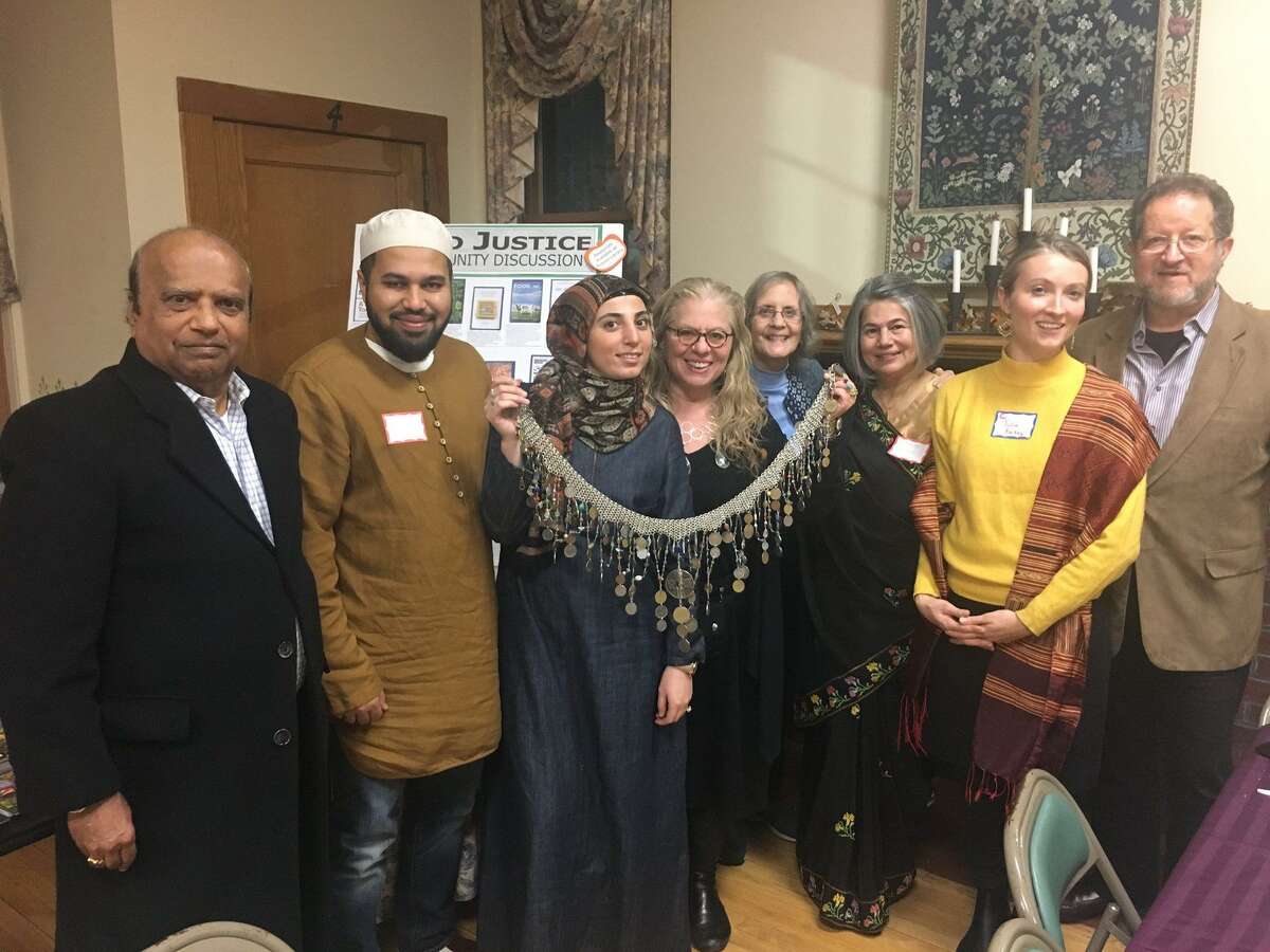 Middletown-based Artists for World Peace are hosting an art sale and interfaith dialogue in Middletown on Sunday. Pictured are participants from the group's previous dialogue event.