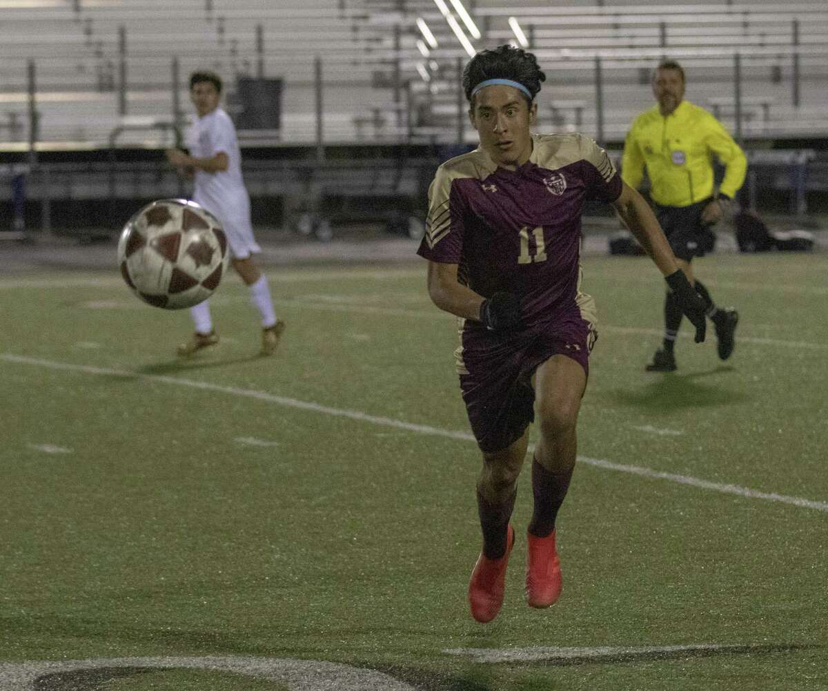 Magnolia West junior Carlos Larios (11) chases after a loose ball during a Region III-5A playoff soccer match Tuesday, April 2, 2019 at College Station High School in College Station.