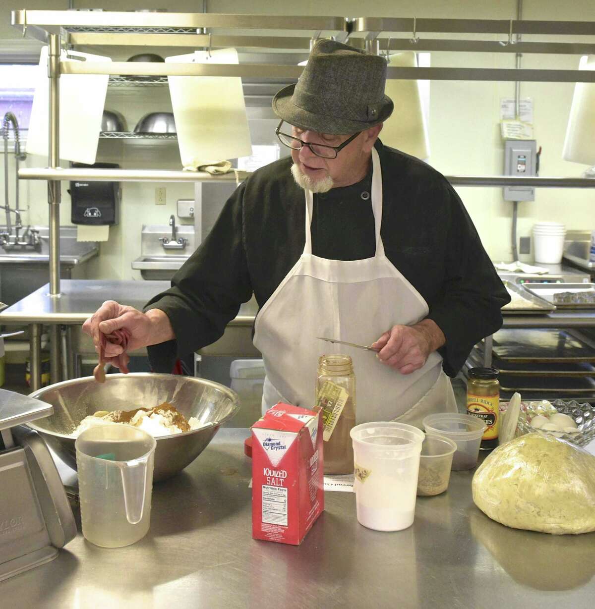 Chef Blythe Roberts, an instructor with the Community Culinary School of Northwestern CT, makes holiday cookies.