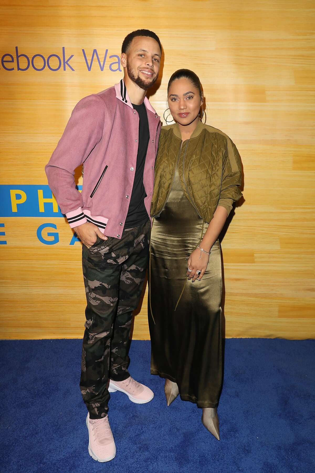 Stephen and Ayesha Curry pose for a photo on the red carpet at 16th Street Station on April 1, 2019 in Oakland, California. 