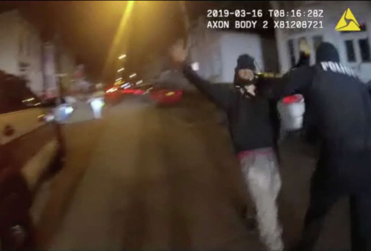 Police body camera footage shows Albany Police Officer Luke Deer taking down Armando Sanchez during a March 16, 2019, altercation on First Street. Officer Deer was charged with felony assault and a misdemeanor count of official misconduct. (Albany Police Department)