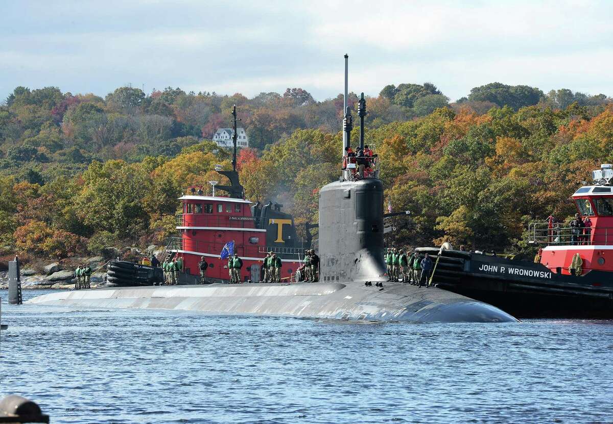 The Virginia-class, fast-attack submarine USS Indiana (SSN 789) transits the Thames River as it arrives at the Naval Submarine Base New London in Groton.