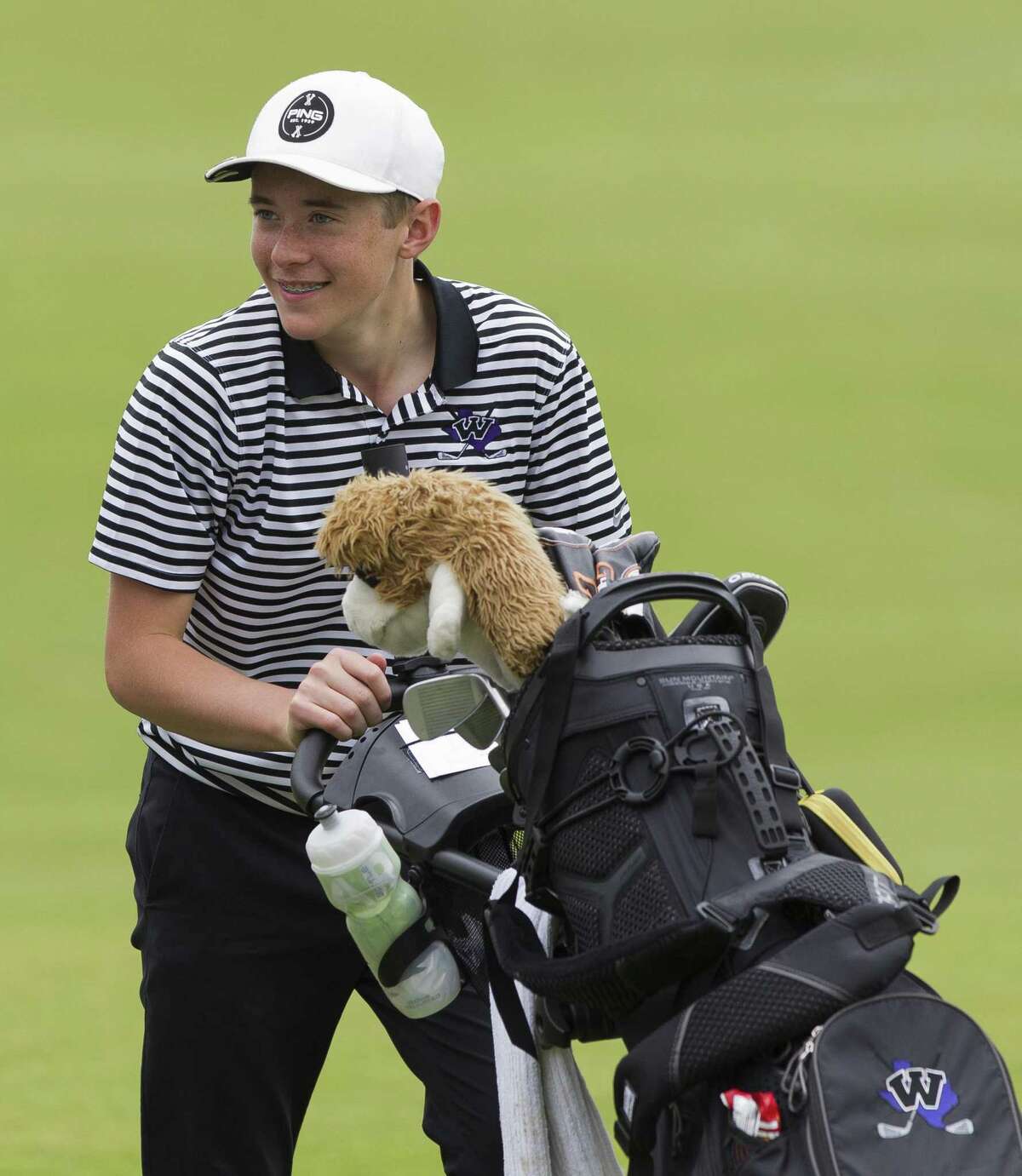 Jack Wiebe of Willis shares a laugh with teammates after finishing the final round of the District 20-5A high school golf tournament at Lake Windcrest Golf Club, Wednesday, April 3, 2019, in Magnolia.