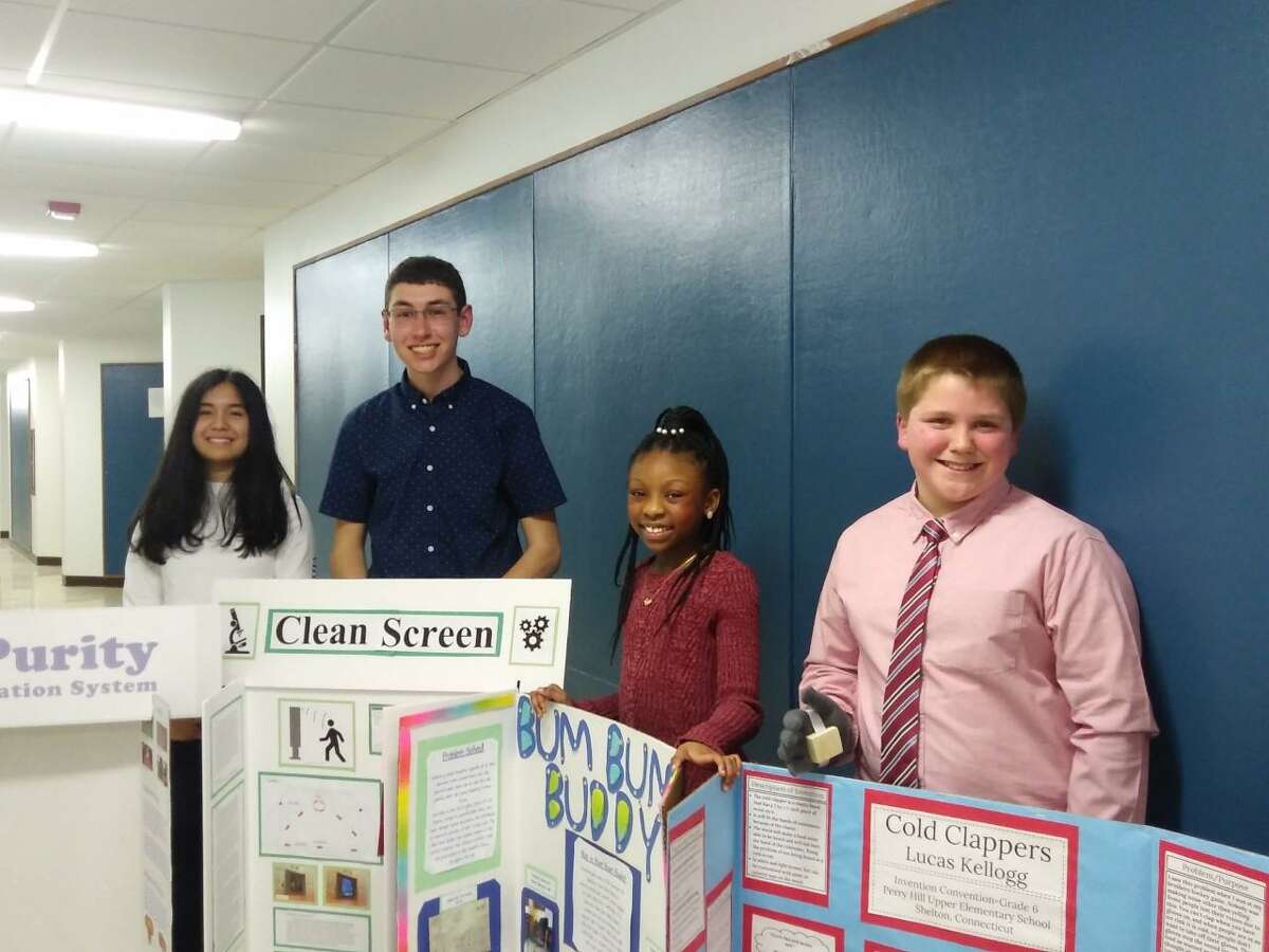 Shelton students Sena Ho, Kyle Young, Kailey Hill and Lucas Kellogg recently gave presentations about their inventions to the Shelton Board of Education. They are among the 14 Shelton students who will take part in the upcoming statewide Invention Convention.
