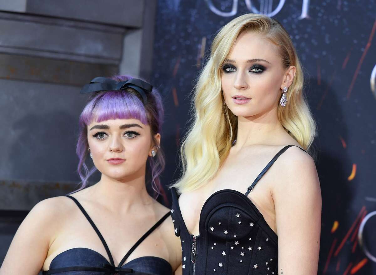British actress Maisie Williams (L) and British actress Sophie Turner (R) arrive for the "Game of Thrones" eighth and final season premiere at Radio City Music Hall on April 3, 2019 in New York city.