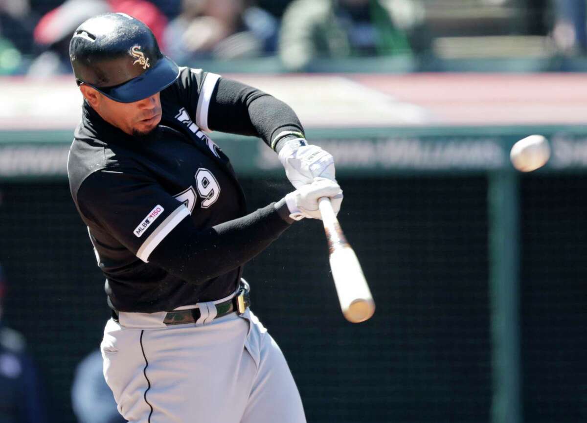 Chicago White Sox Jose Abreu hits a two-run double off Cleveland Indians starting pitcher Corey Kluber in the fourth inning of a baseball game, Wednesday, April 3, 2019, in Cleveland. Yoan Moncada and Leury Garcia scored on the play. (AP Photo/Tony Dejak)