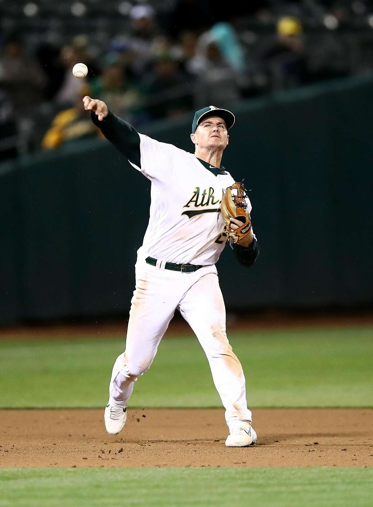 OAKLAND, CALIFORNIA - APRIL 03: Matt Chapman #26 of the Oakland Athletics throws out Eduardo Nunez #36 of the Boston Red Sox in the sixth inning at Oakland-Alameda County Coliseum on April 03, 2019 in Oakland, California. (Photo by Ezra Shaw/Getty Images)
