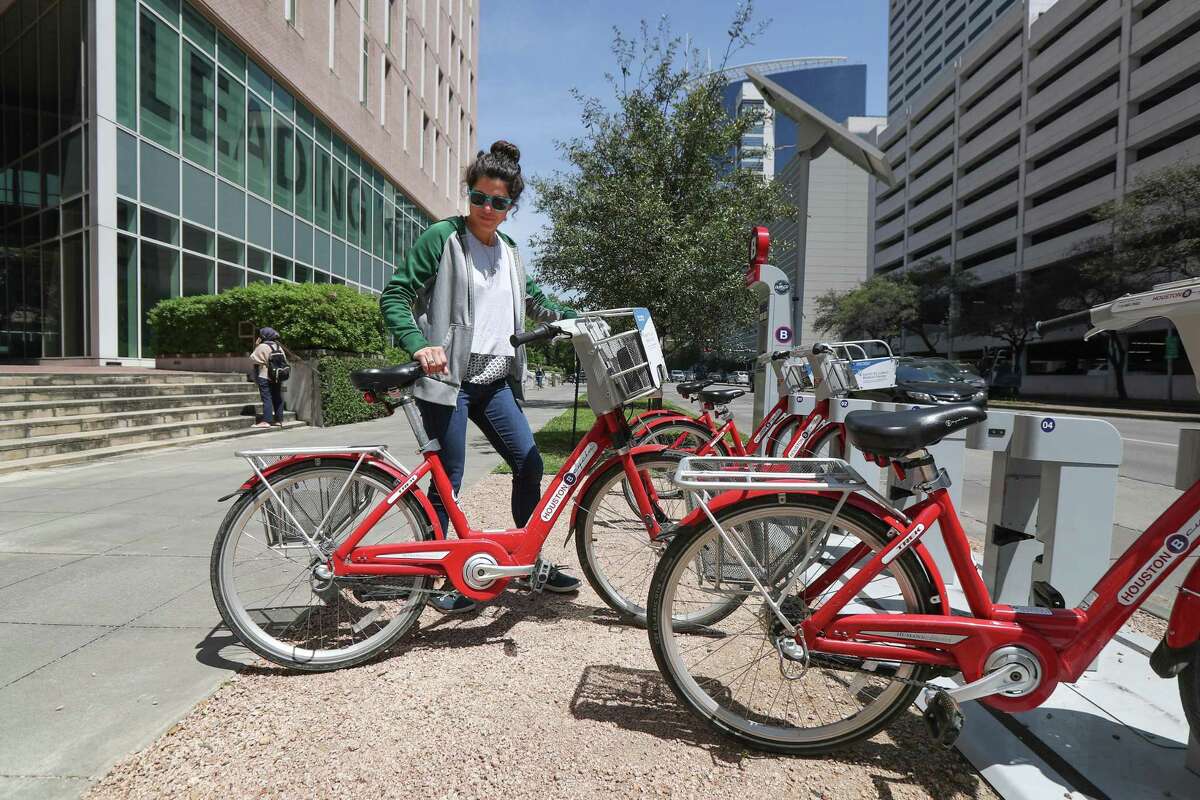 "I use it all the time to go and get coffee or to run quick errands" Gisele Caleron said as she checked out a B-Cycle bike sharing system bike in the Texas Medical Center on April 2.