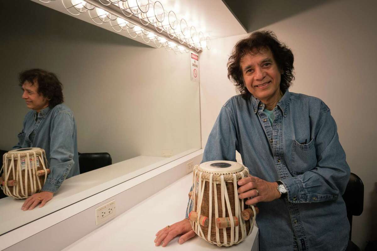 Zakir Hussain holds the Tabla in a dressing room after a rehearsal for the world premiere of Alonzo King LINES Ballet 35th Anniversary at YBCA Theater in San Francisco, Calif. on Thursday, April 5, 2018.