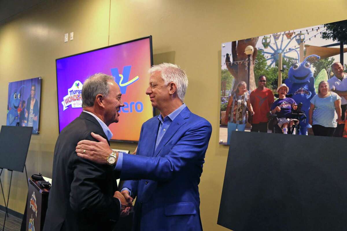 Gordon Hartman (right) announces the creation of Morgan’s Wonderland Camp, which will open on 100 acres on the North Side. With him is Joe Gorder, president and CEO of Valero Energy Corp. Valero is donating $15 million to the camp. Gorder and his wife, Lacie, are giving $2.5 million.