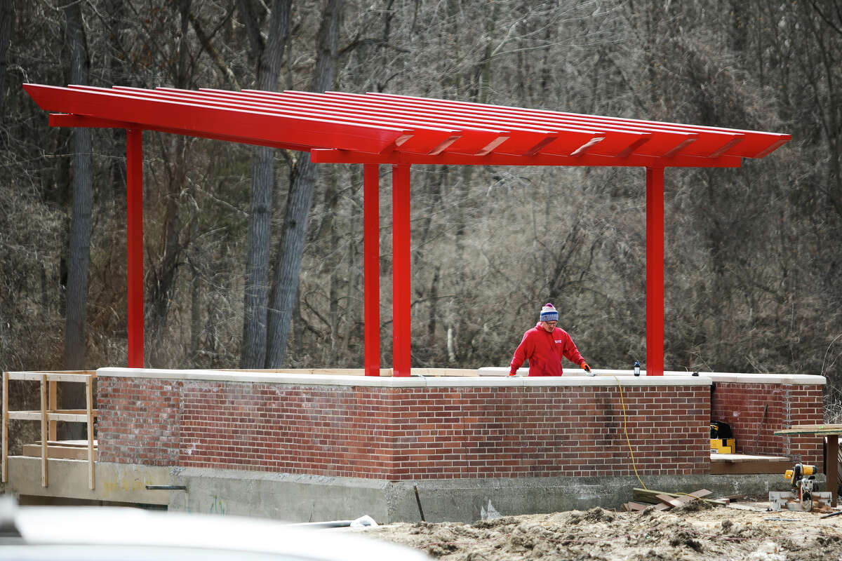 Construction continues on a river overlook structure at Upper Emerson Park, where a pumphouse once stood, on Thursday, April 4, 2019. (Katy Kildee/kkildee@mdn.net)