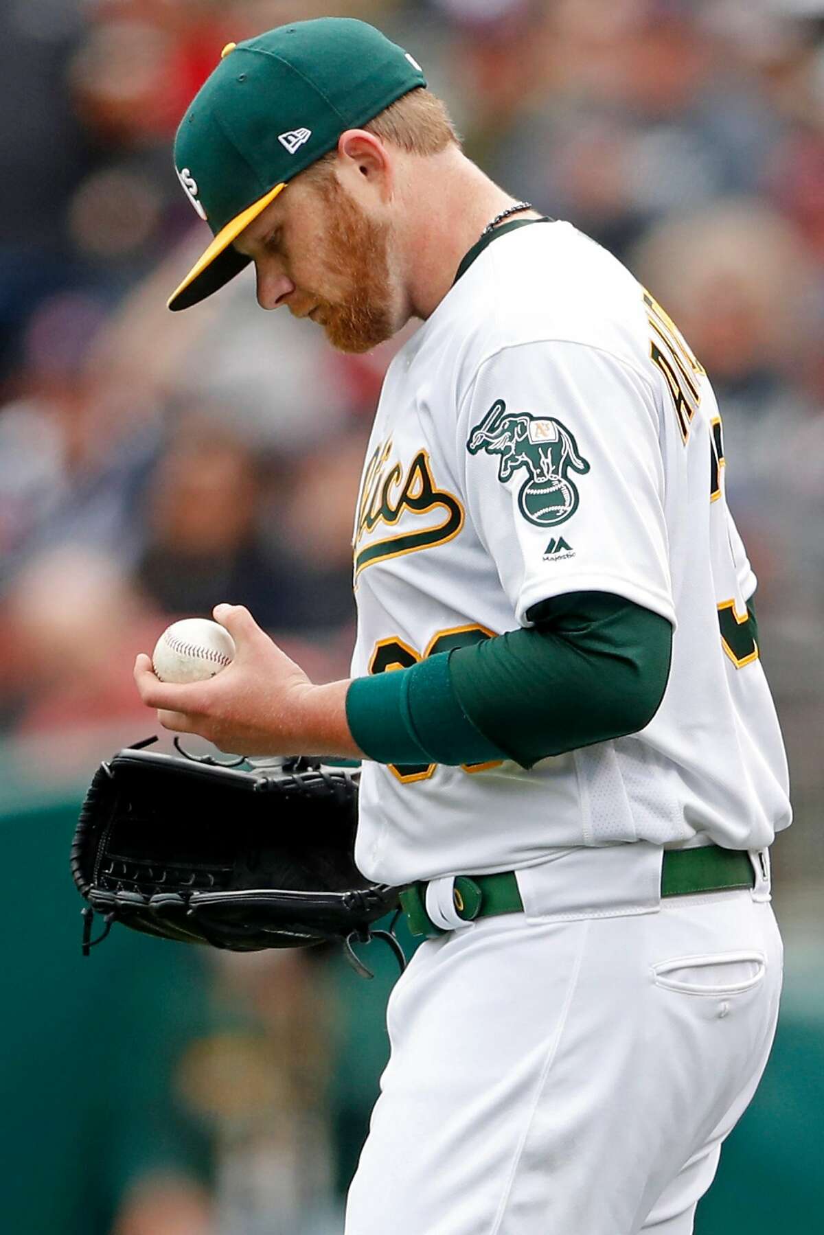 Oakland Athletics' starting pitcher Brett Anderson reacts to walking in a run in 1st inning against Boston Red Sox during MLB game at Oakland Coliseum in Oakland, Calif., on Thursday, April 4, 2019.