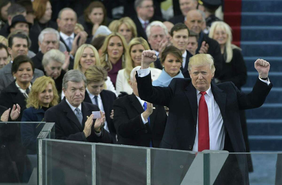 (FILES) In this file photo taken on January 20, 2017 US President Donald Trump acknowledges the crowd during his swearing-in ceremony at the US Capitol in Washington, DC. - The White House said February 5, 2019 that a new corruption investigation into President Donald Trump's inauguration has nothing to do with Trump himself. Federal prosecutors in New York issued a subpoena Monday for financial and other records to the Trump Inaugural Committee, seeking information on the $107 million it raised for festivities to celebrate the billionaire developer's election victory as he took office on January 20, 2017.A spokesperson for the committee confirmed that they were reviewing the subpoena, adding that "it is our intention to cooperate with the inquiry." (Photo by Mandel NGAN / AFP)MANDEL NGAN/AFP/Getty Images