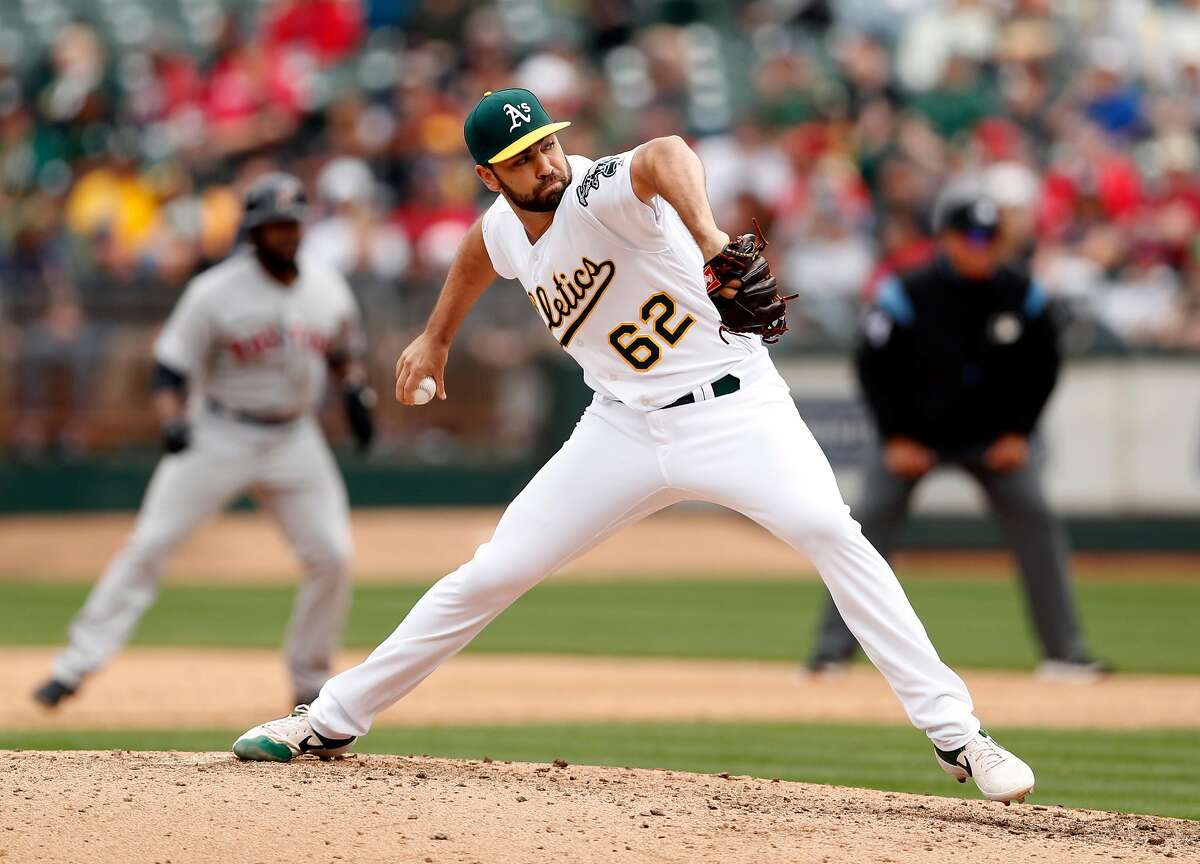 Oakland Athletics' Lou Trivino pitches in 6th inning against Boston Red Sox during MLB game at Oakland Coliseum in Oakland, Calif., on Thursday, April 4, 2019.