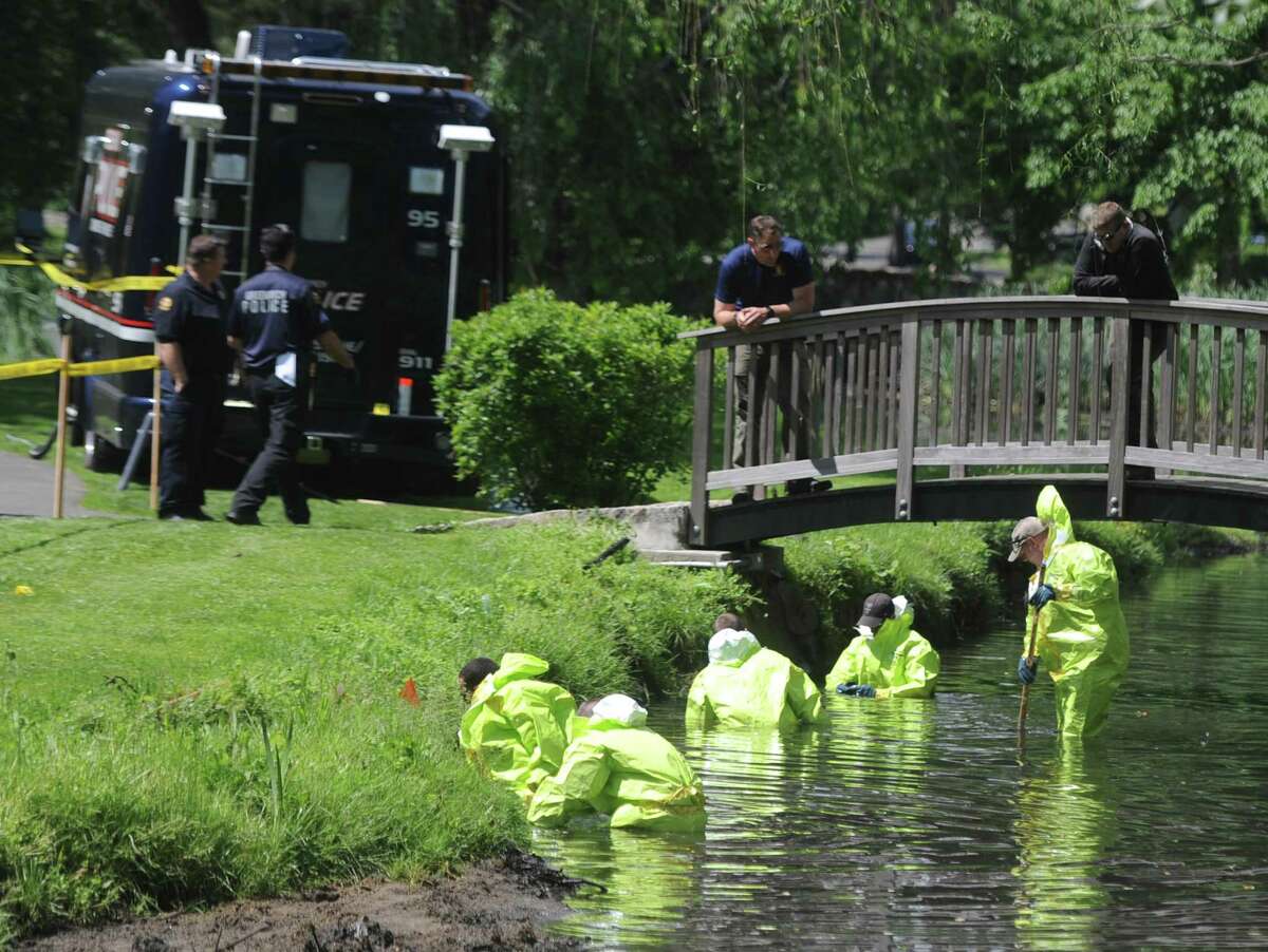 Investigators continue the investigation of found human remains by sweeping Binney Park in Old Greenwich, Conn. Thursday, June 8, 2017. Decomposed human remains were found in April 2017 at Helen Binney Kitchel Natural Park, located caddycorner to Binney Park and connected by a stream.