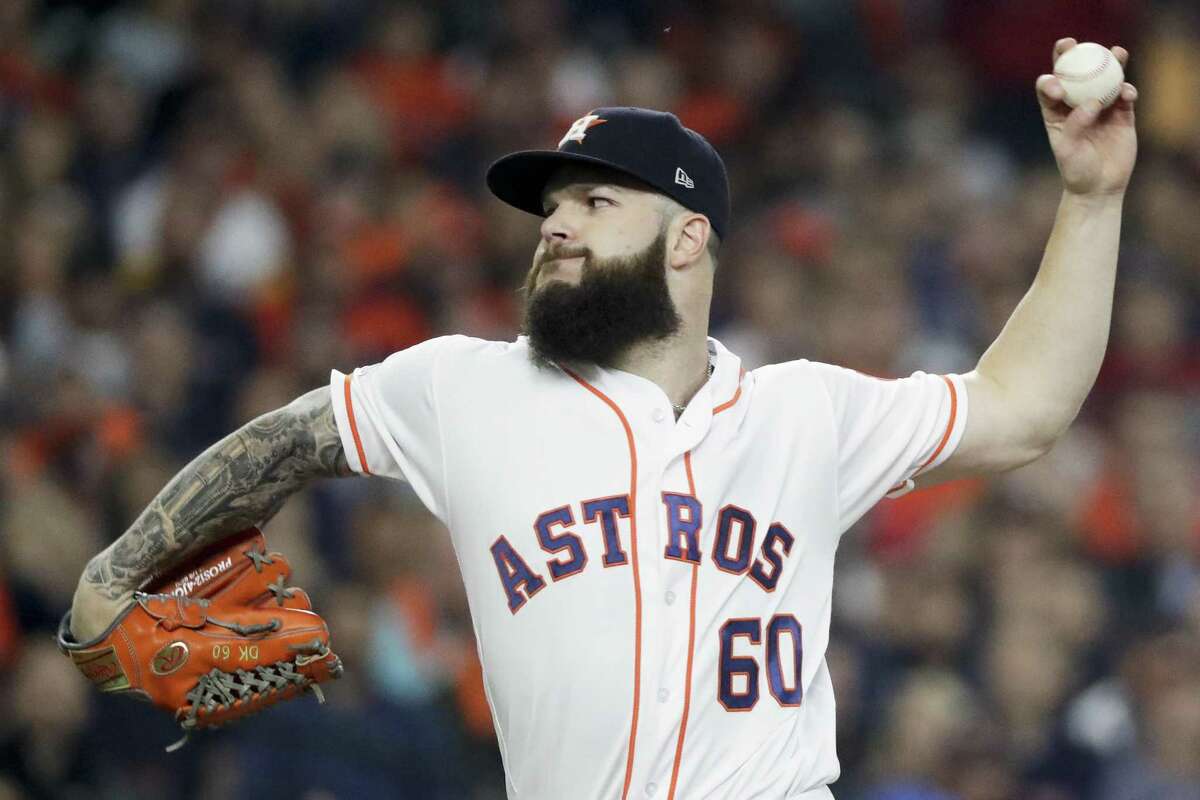 PHOTOS: Dallas Keuchel through the years  FILE - In this Oct. 16, 2018, file photo, Houston Astros starting pitcher Dallas Keuchel throws against the Boston Red Sox during the first inning in Game 3 of a baseball American League Championship Series in Houston. >>>Browse through the photos for a look back at the star pitcher's time with the Astros ... 