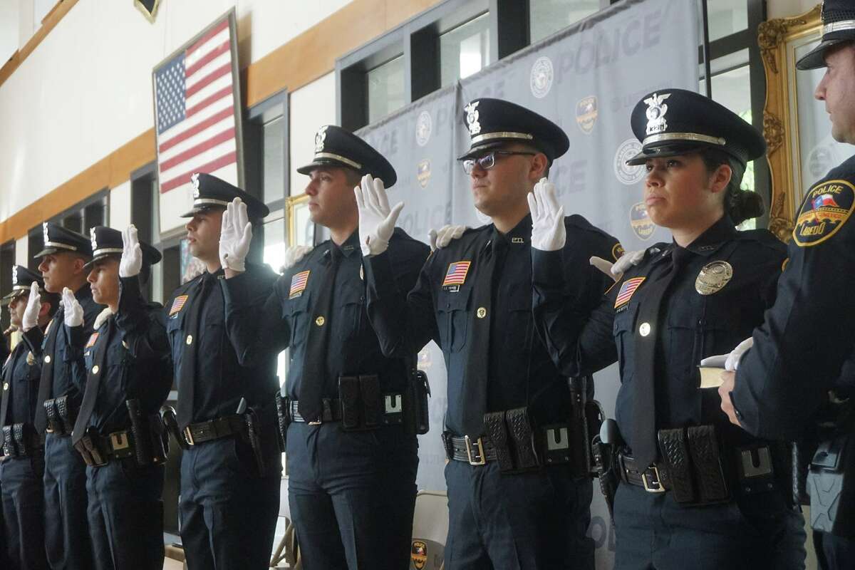 Laredo police sworn in six men and one woman into their ranks on Friday morning during a pinning of the badge ceremony.