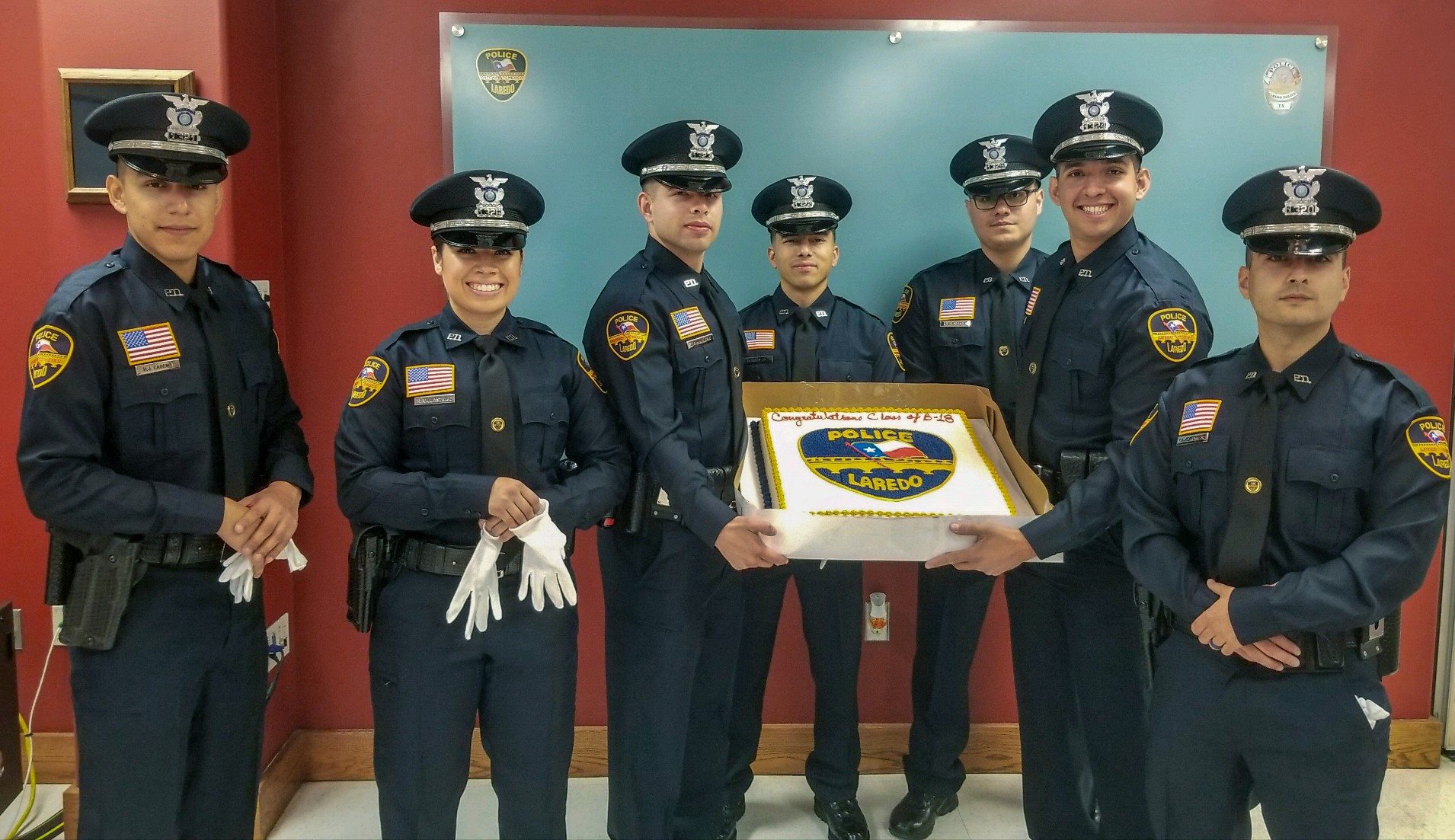 'We're proud to be here' Seven new officers sworn in with Laredo