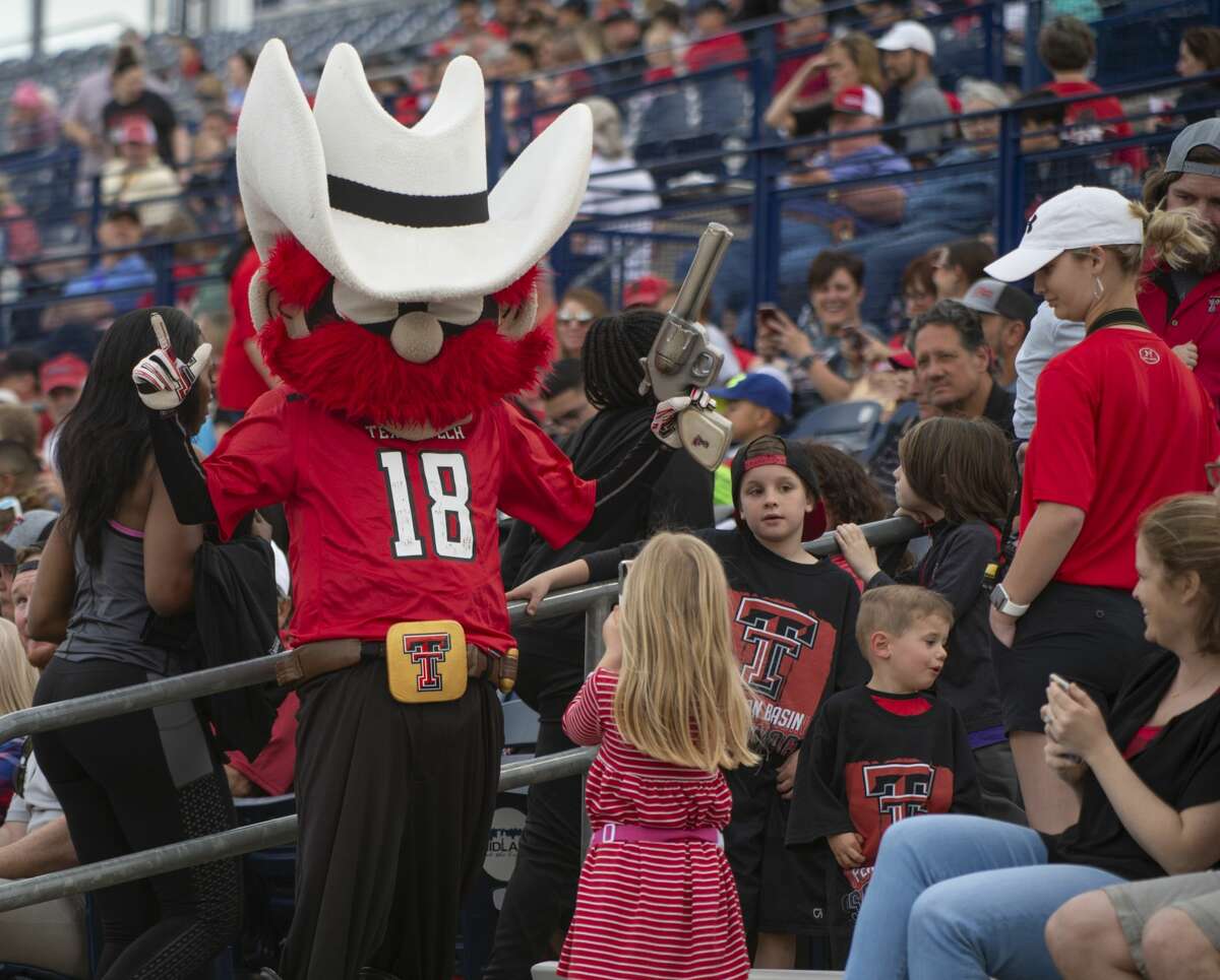 Texas Tech's Roper Red takes pictures with fans 04/05/19 at the annual football scrimmage at Grande Communications Stadium. Tim Fischer/Reporter-Telegram