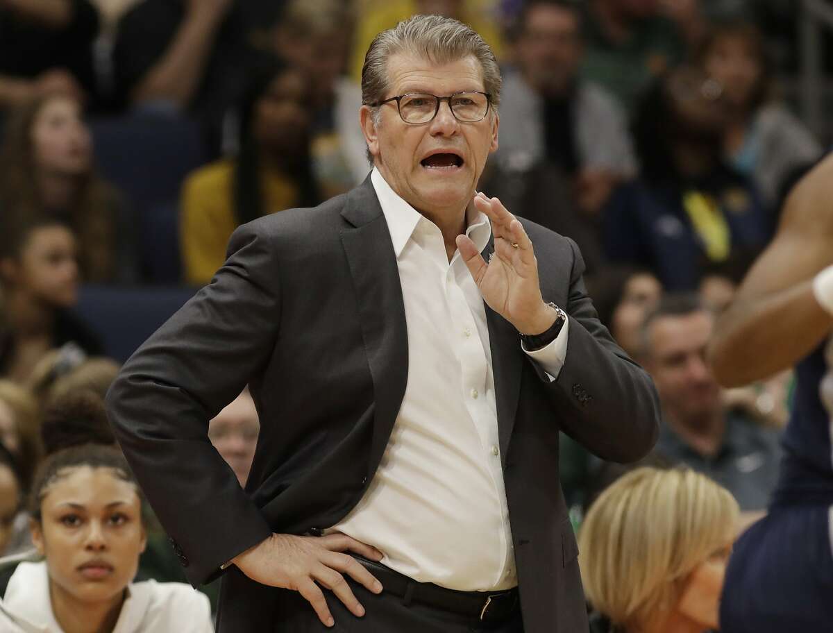 Connecticut head coach Geno Auriemma gestures to his team during the first half of a women's Final Four NCAA college basketball semifinal tournament game against Notre Dame, Friday, April 5, 2019, in Tampa, Fla. (AP Photo/Chris O'Meara)