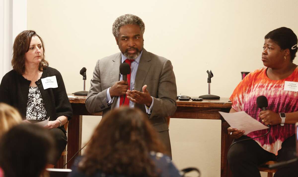 Texas Education Agency Deputy Commissioner of Governance AJ Crabill talks during a town hall with residents at the First Evangelical Lutheran Church Saturday, April 6, 2019, in Houston. Tracy Lisewsky (left) and LaTrice Ferguson (right) severed as moderators.