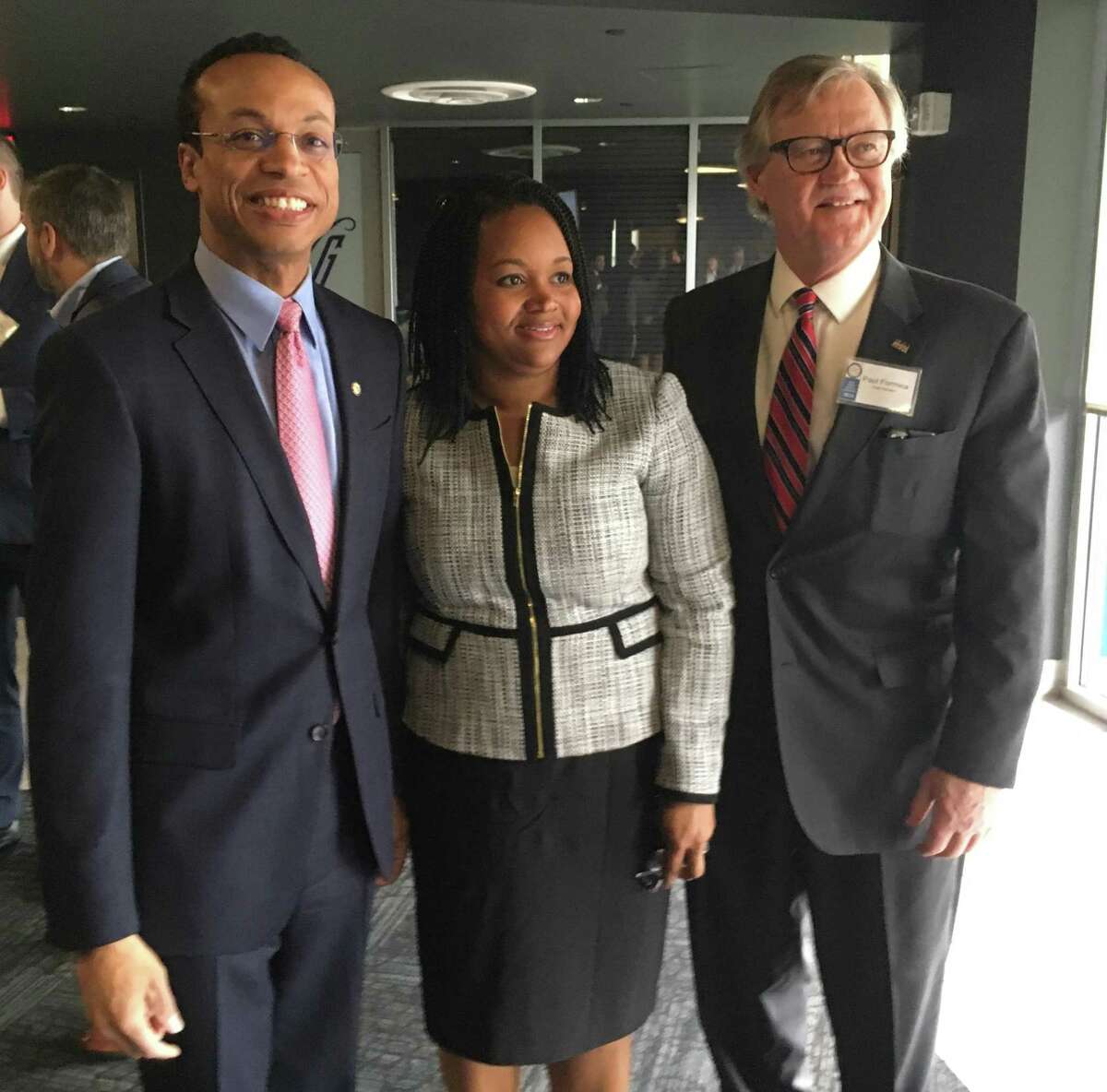 State Treasurer Shawn Wooden, Melissa McCaw, the governor's budget and policy chief and Sen. Paul Formica, R-East Lyme, at the Treasurer's annual debt and pension conference Friday in Hartford.