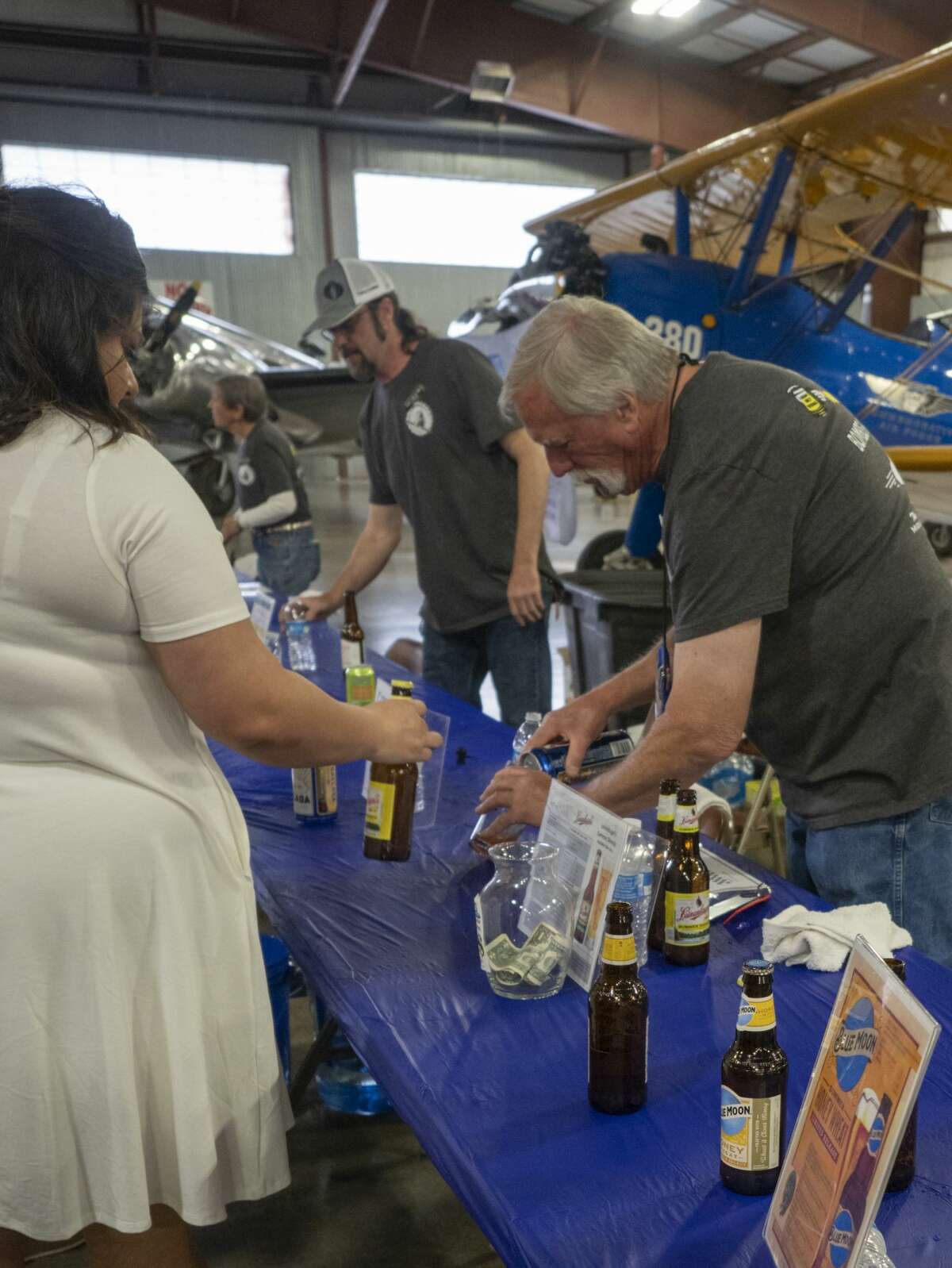 Beer lovers enjoy a night of tasting 04/06/19 at the High Sky Wing of the CAF Hops & Props fundraiser in the High Sky Wing hanger. Tim Fischer/Reporter-Telegram