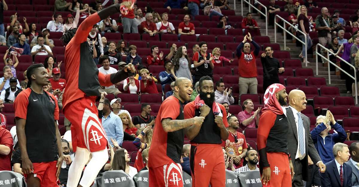 Houston Rockets starters celebrate when their team broke an NBA record for three-point shots, making 27 of them against Phoenix Suns at the Toyota Center on Sunday, April 7, 2019. Rockets won the game 149-113.