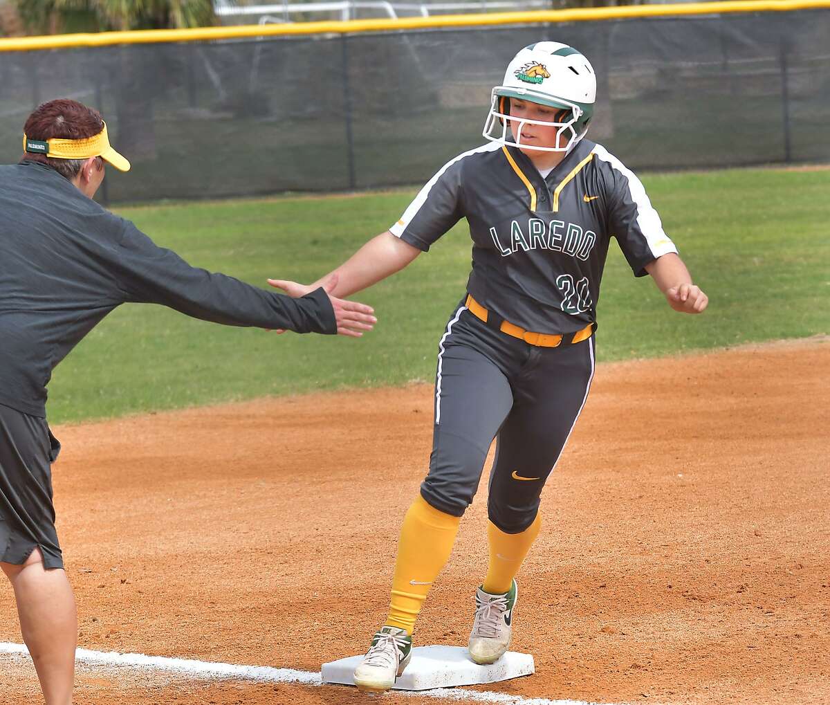 The Laredo College softball team split its doubleheader against Coastal Bend to move into a three-way tie for fifth place in the Region XIV South Zone Division.