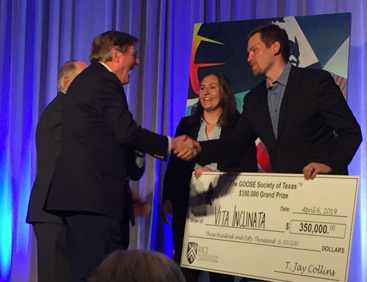 Vita Inclinata Technologies accepts a cash prize at the 2019 Rice Business Plan Competition.