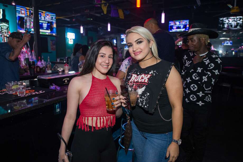 A typical Sunday night in San Antonio took a wild turn at Cantina with the bar's ongoing bikini contest on April 7, 2019. Women competed for a $300 prize while other bar goers drank, played games and had a chance to buy goods from vendors. Photo: Kody Melton, For MySA.com