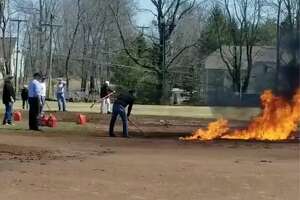 Ridgefield coaches put on leave after baseball field fire