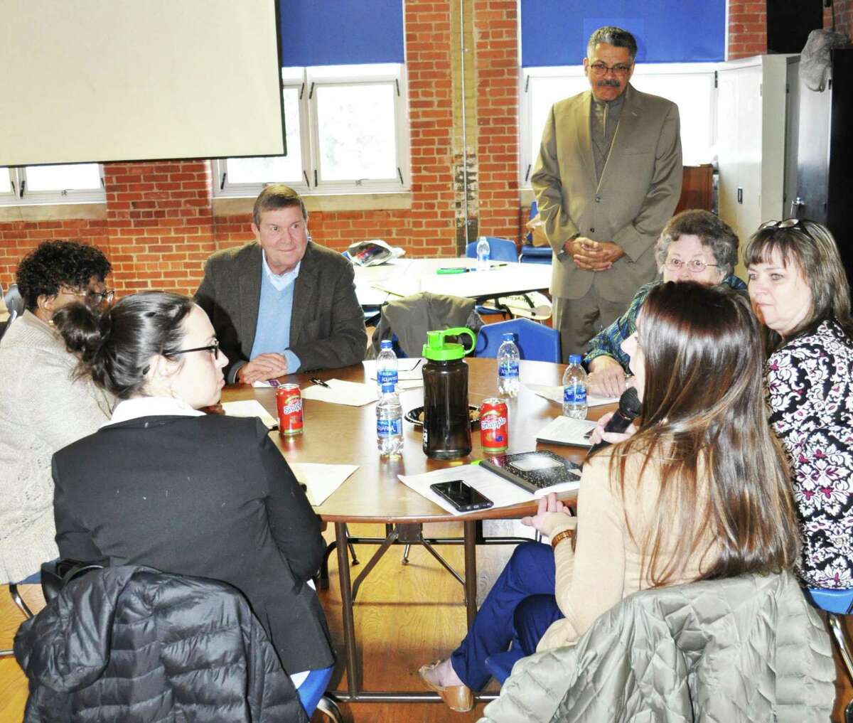 State Rep. Kara Rochelle listens as Melissa Boneski, a Bridgeport kindergarten teacher, proposes a professional development day dealing with students and trauma in Ansonia’s school system during the April 4 ,2019 Equity in Education discussion at the Boys and Girls Club in Ansonia..