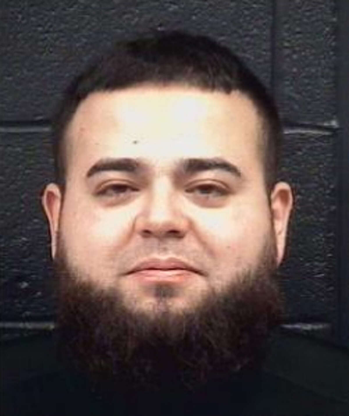 David Gerardo Alcacio was charged with driving while intoxicated.