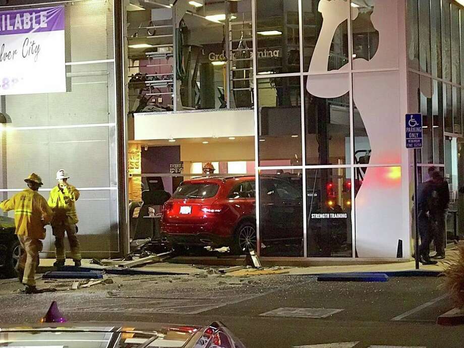 Video Catches Car Crashing Into Calif Gym Wall Knocking Man Off
