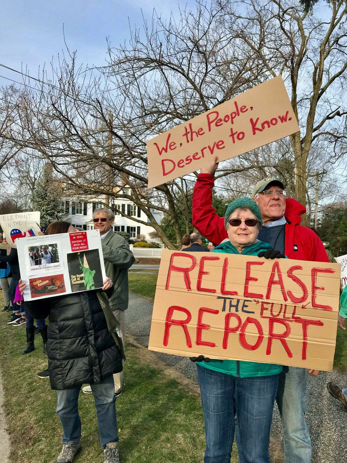 Protestors gather at Old Town Hall Green to call for the full release of special counsel Robert Mueller's report.