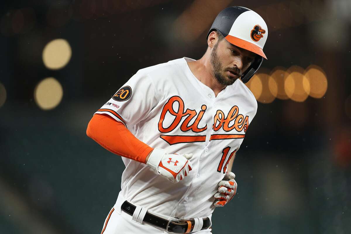 BALTIMORE, MARYLAND - APRIL 08: Trey Mancini #16 of the Baltimore Orioles rounds the bases after hitting a home run against the Oakland Athletics during the first inning at Oriole Park at Camden Yards on April 8, 2019 in Baltimore, Maryland. (Photo by Patrick Smith/Getty Images)