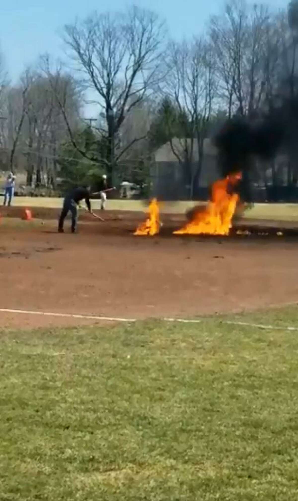 On Saturday, 25 gallons of gasoline were poured onto the infield of Ciuccoli Field, in Ridgefield, and lit on fire in an attempt to make the field playable for the Ridgefield High School baseball team.
