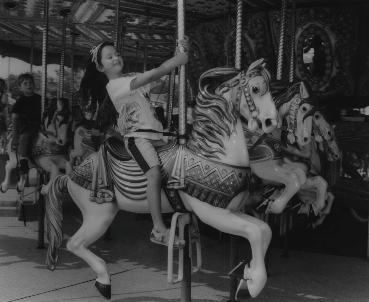 Click through the slideshow to see historical photos of Capital Region carousels. Altamont Fair, New York - Five-year-old Jasmine Holmberg of Albany, riding a winner at the fair. August 20, 1994 (Luanne M. Ferris/Times Union Archive)