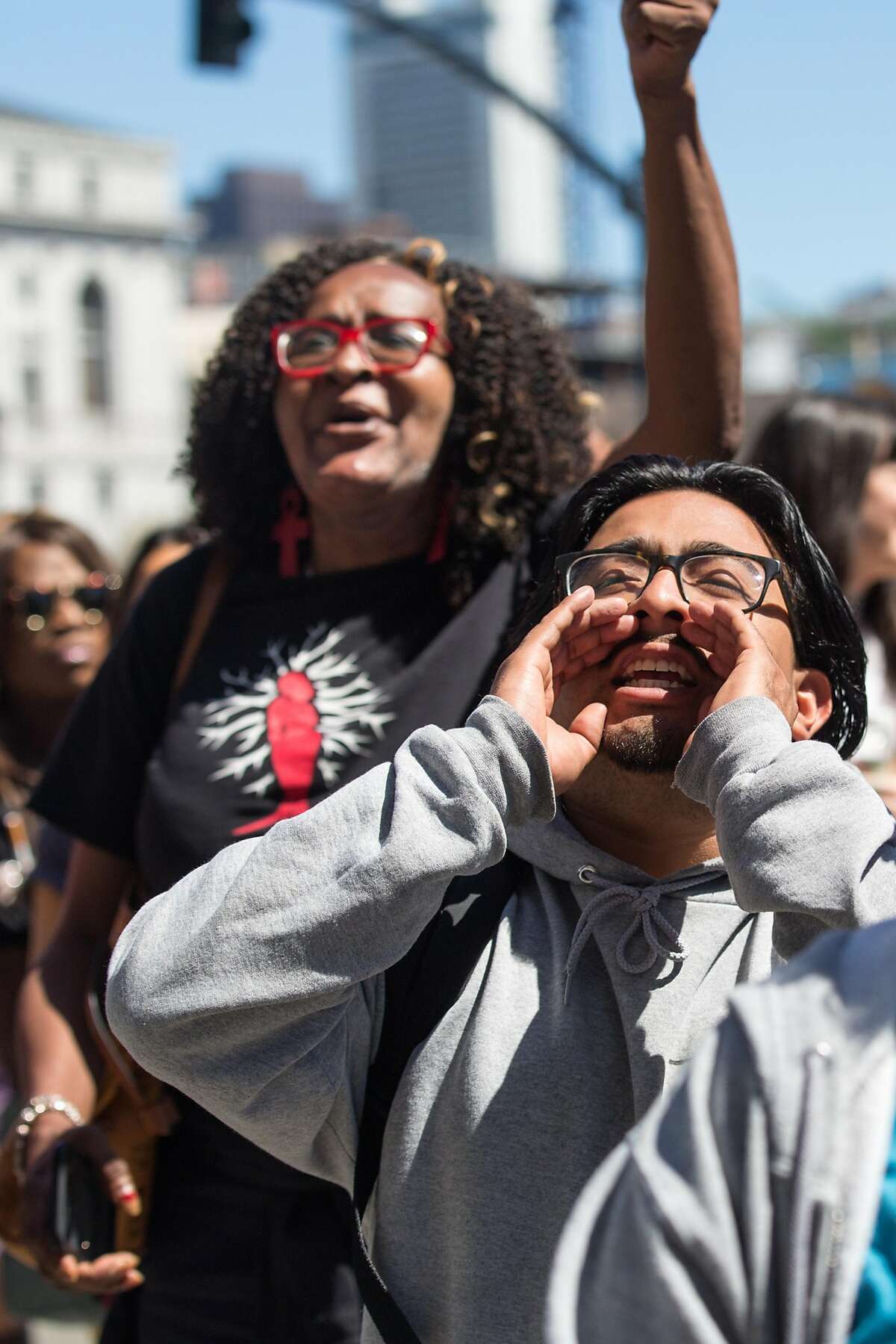 Nick Derenzi, front, and Janetta Johnson take part at a rally in support of the new proposal to close San Francisco juvenile hall. On Tuesday, April 9, 2019. San Francisco, Calif.