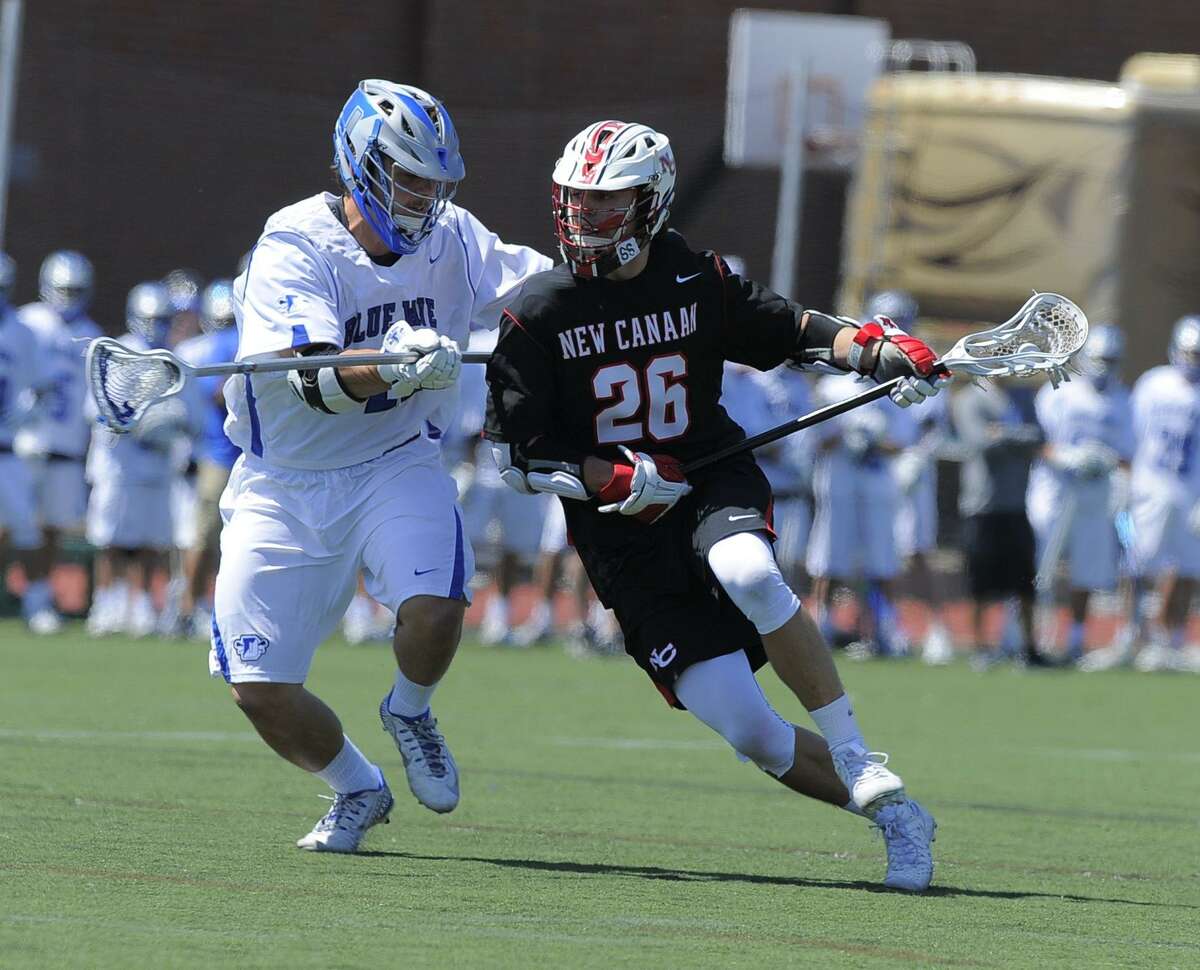 Mark Evanchick of Darien, left, shown in a 2016 game, and his Penn teammates will take on Vermont at Wilton High on April 27.