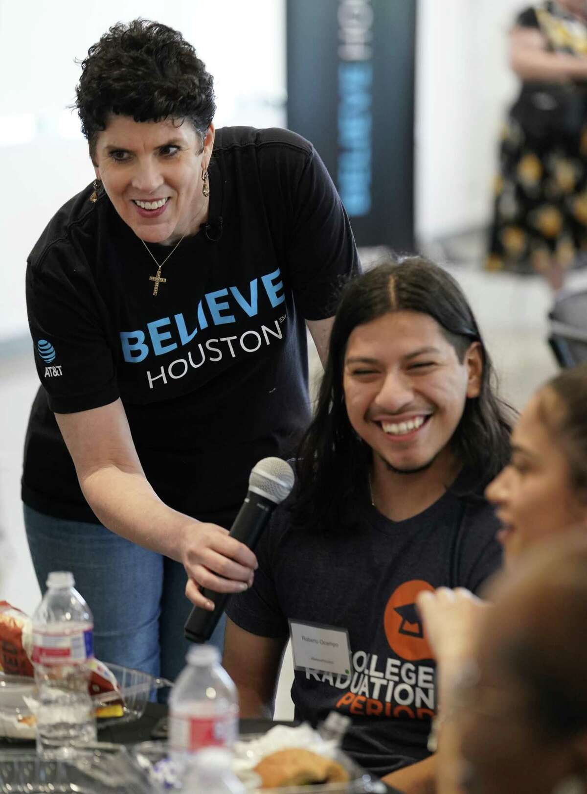 Tracy King, AT&T vice president for public affairs, left, talks with Sonnier Laday, 17, a senior at Davis High School, during an event at BakerRipley East Aldine Campus 3000 Aldine Mail Route Road, announcing an investment in Houston and the Complete Communities program on Tuesday, April 9, 2019.