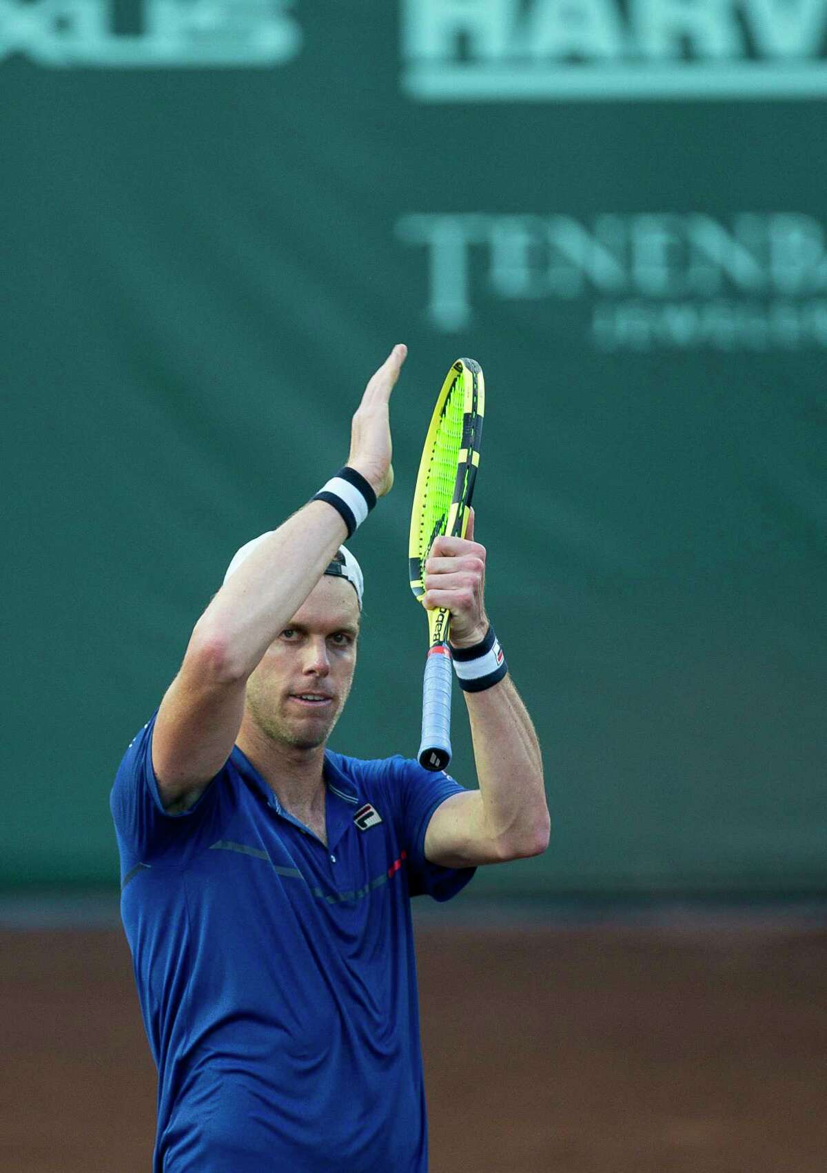 Sam Querrey celebrates his won over Bjorn Fratangelo in a first round match of the Fayez Sarofim & Co. U.S. Men's Clay Court Championship at River Oaks Country Club in Houston, Tuesday, April 9, 2019.