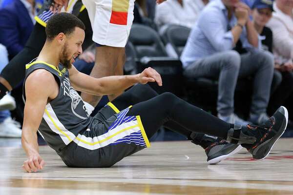 Image result for Stephen Curry injures ankle, leaves game against Pelicans