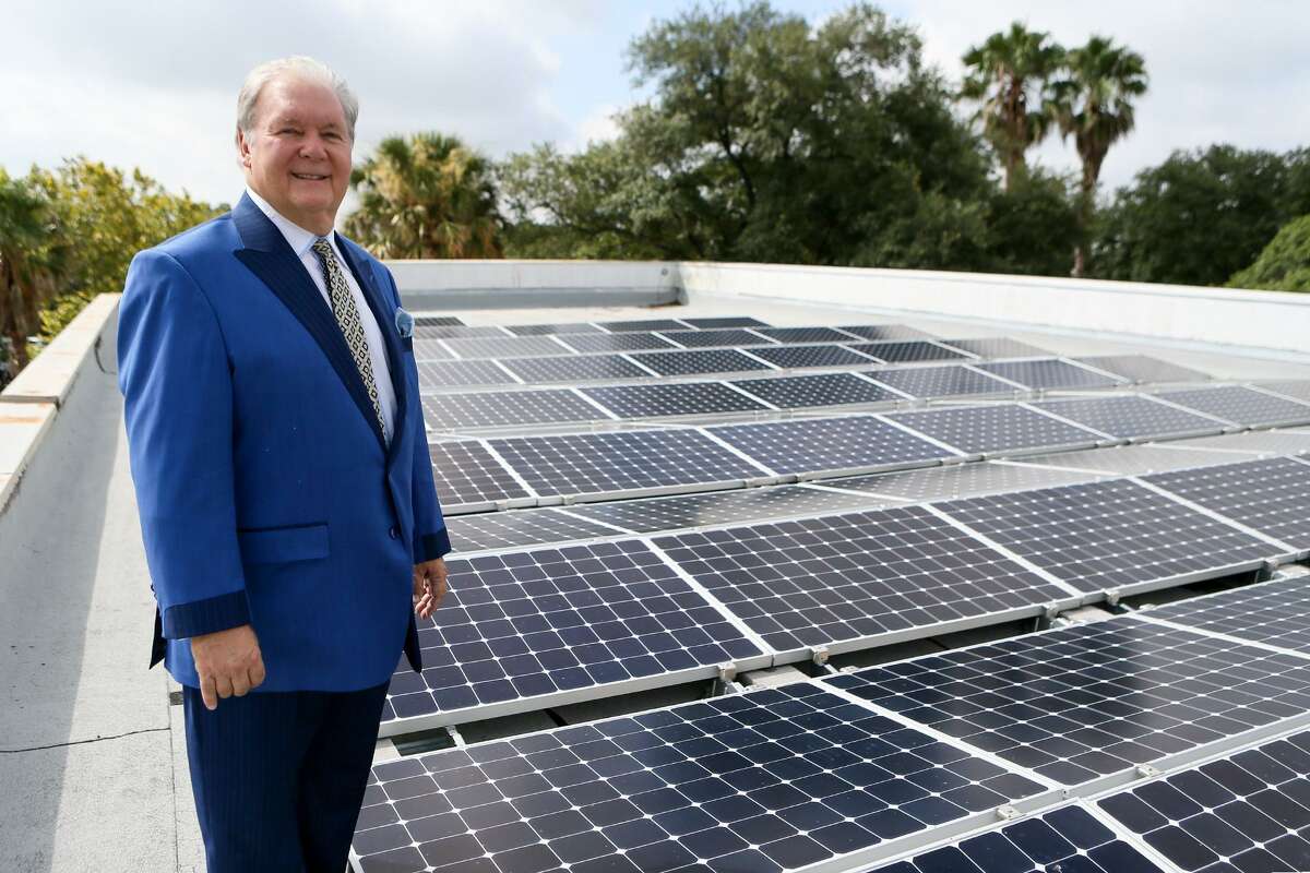 Robert “Dick” Tips, chairman and CEO of Mission Park Funeral Chapels and Cemeteries, with an installation of solar panels on the rooftop of Mission Park North, 3401 Cherry Ridge, in 2017.