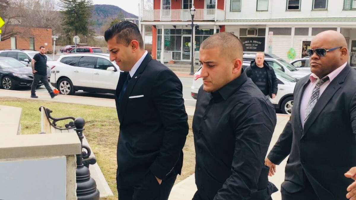 Nauman Hussain, left, arrives in Schoharie County Court with his brother on Wednesday, April 10, 2019, to be arraigned on 20 counts of criminally negligent homicide and 20 counts of second-degree manslaughter. Hussain is the operator of the limousine company involved in the Schoharie crash that killed 20. (Larry Rullison / Times Union)